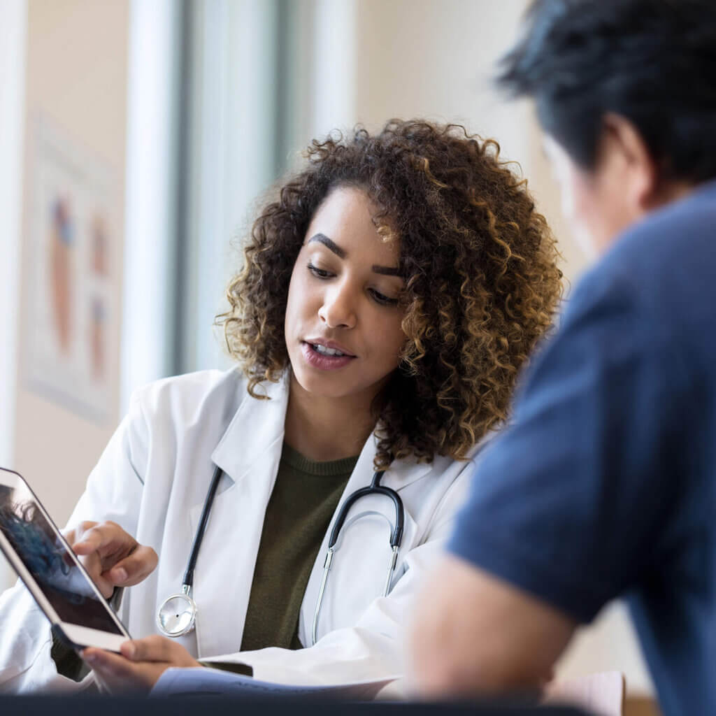 Healthcare worker looking at a healthcare loan document