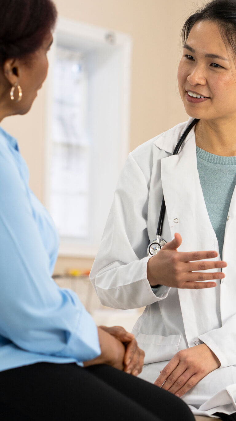 A doctor discussing healthcare directives with her patient.