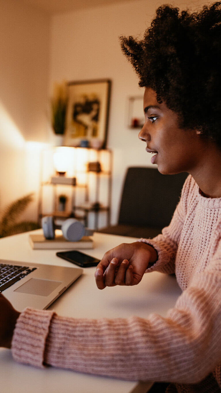 Investor working in her home office