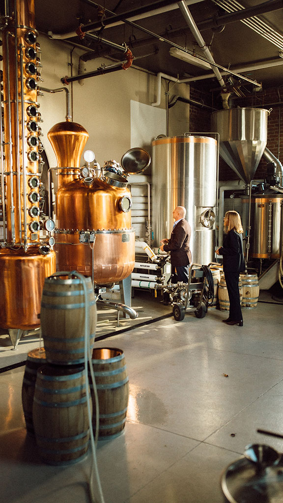 GCL team examining brewery equipment