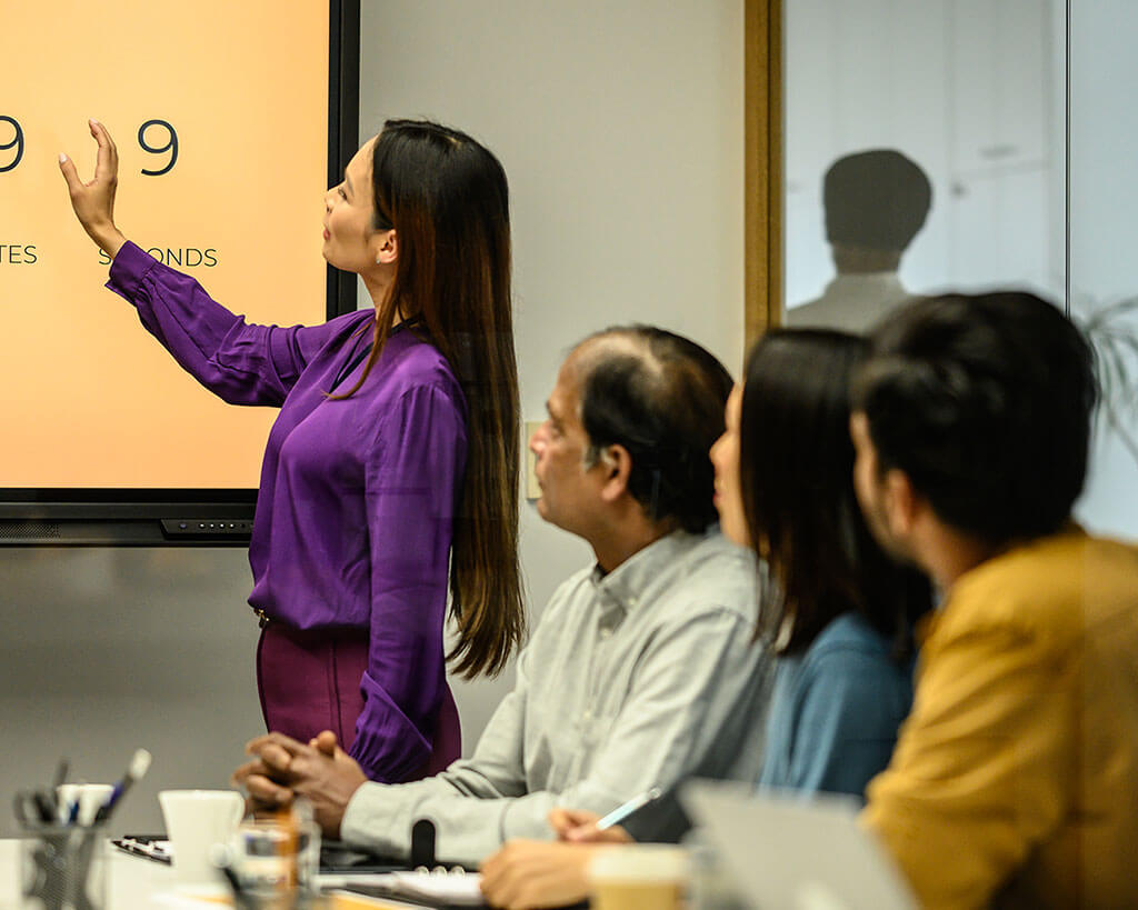 Business professional meeting about commercial loan special asset servicing options.