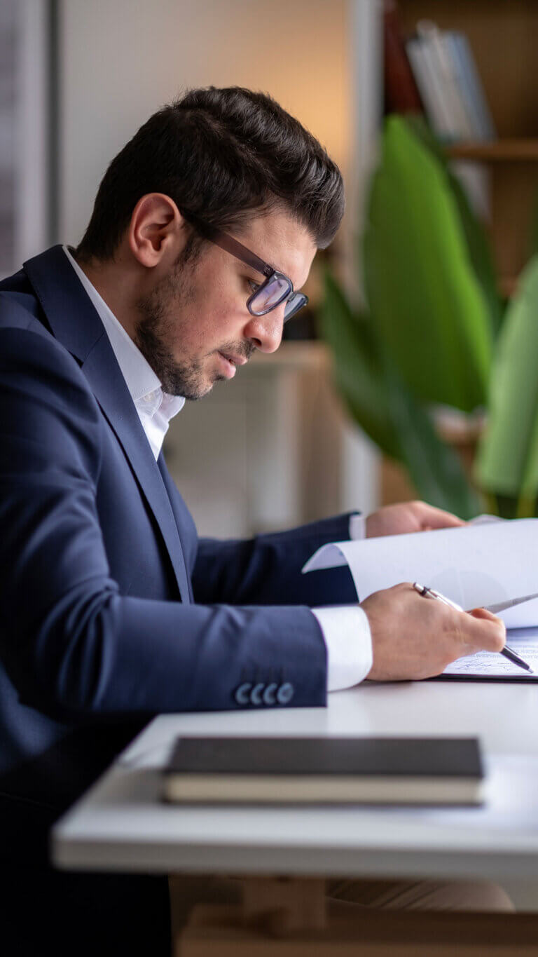 Business professional doing commercial loan credit administration services for an institution